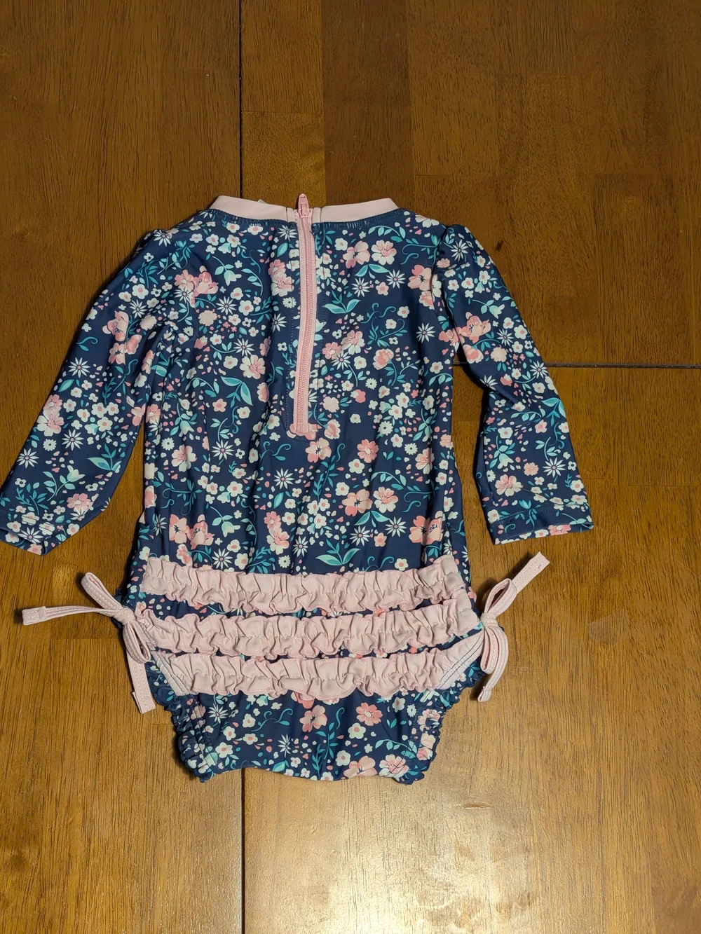 Ruffle Butts Navy Floral Long-Sleeve Swim Suit with Pink Trim